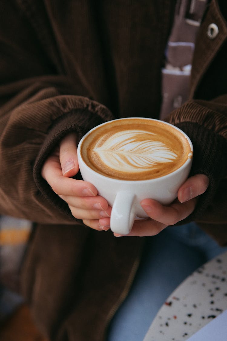 Woman Holding Coffee