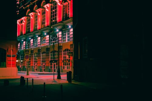 Free A beautifully illuminated building in Moscow, Russia at night, showcasing stunning architectural details. Stock Photo