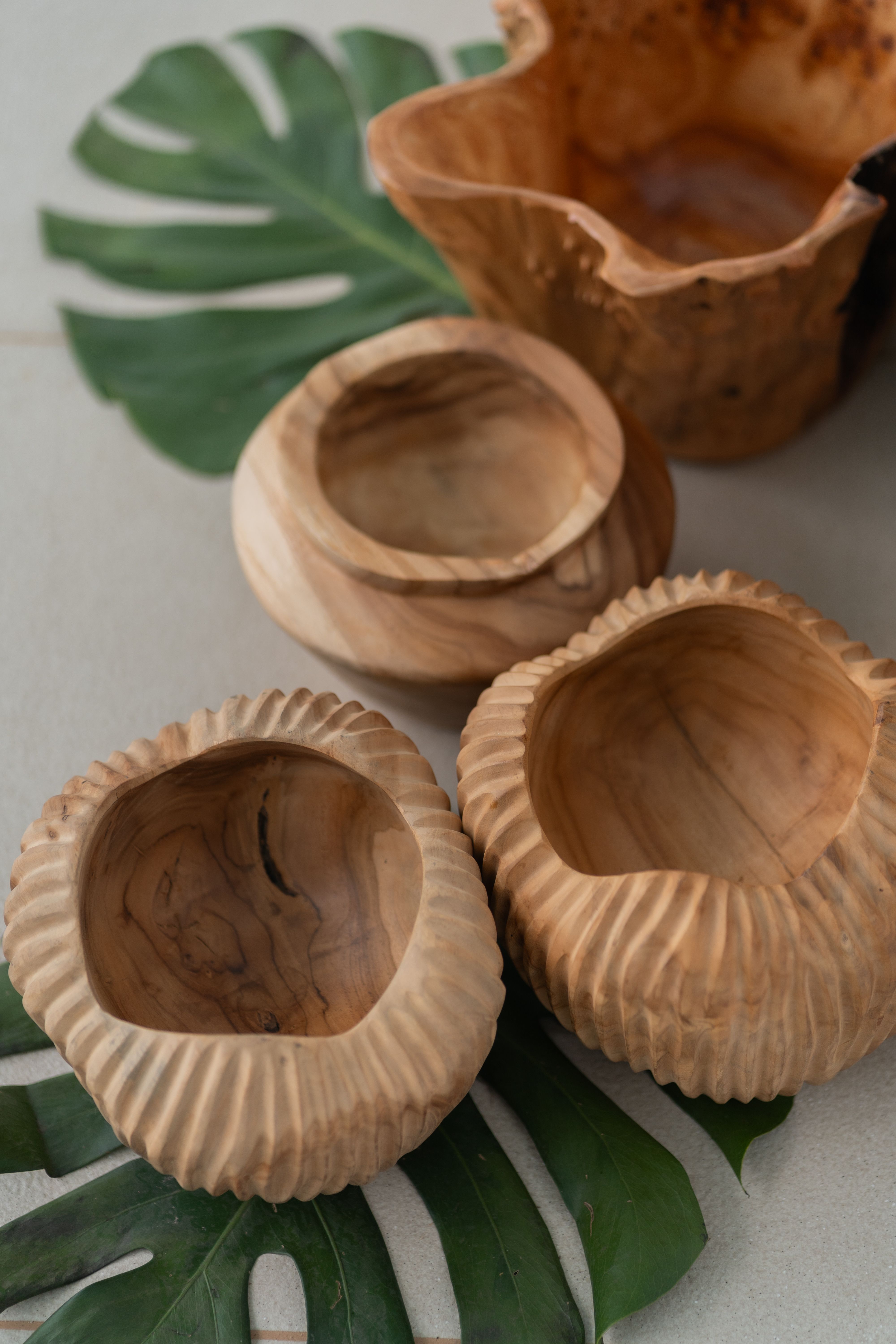 Wooden Bowls on Monstera Leaf  Free Stock Photo