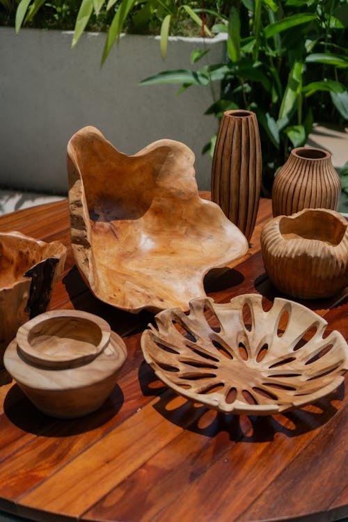 Wooden bowls and vases on a table