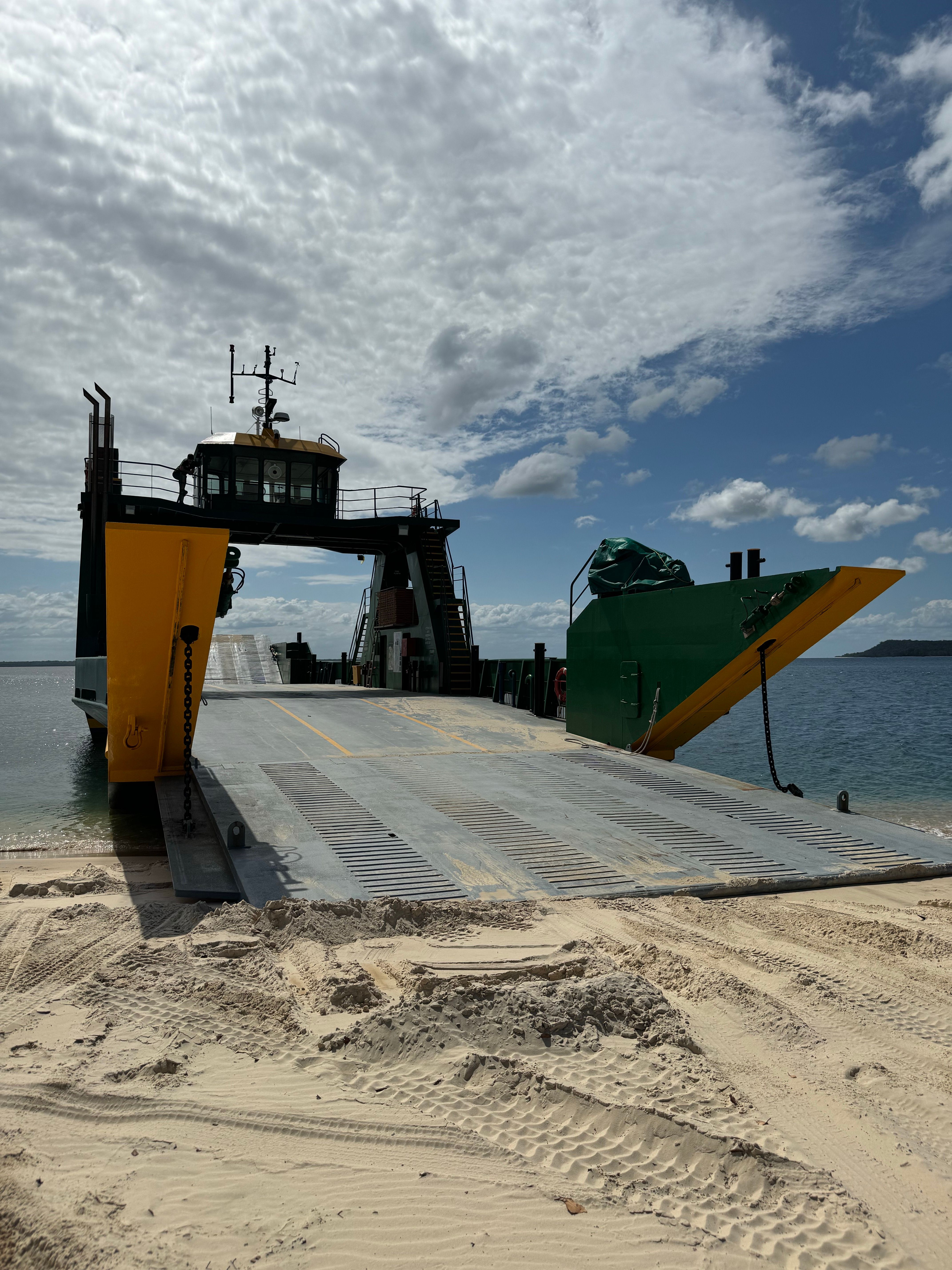 Car ferry crossing open water, like the Cape May-Lewes Ferry to Delaware