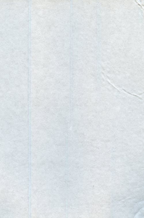 A white paper with blue lines on it