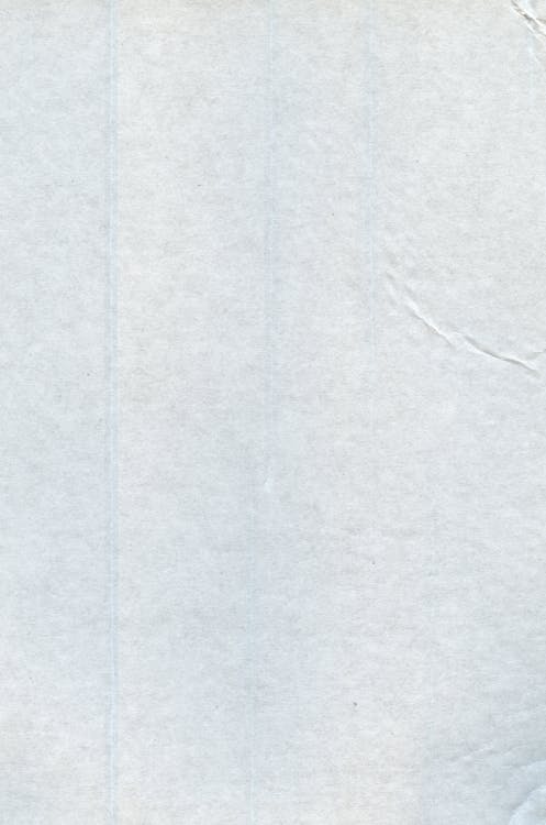 A white paper with blue lines on it