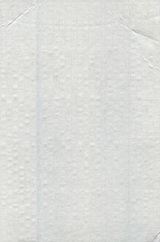 Close-up of a white paper texture with subtle creases and grids, ideal for design backgrounds.
