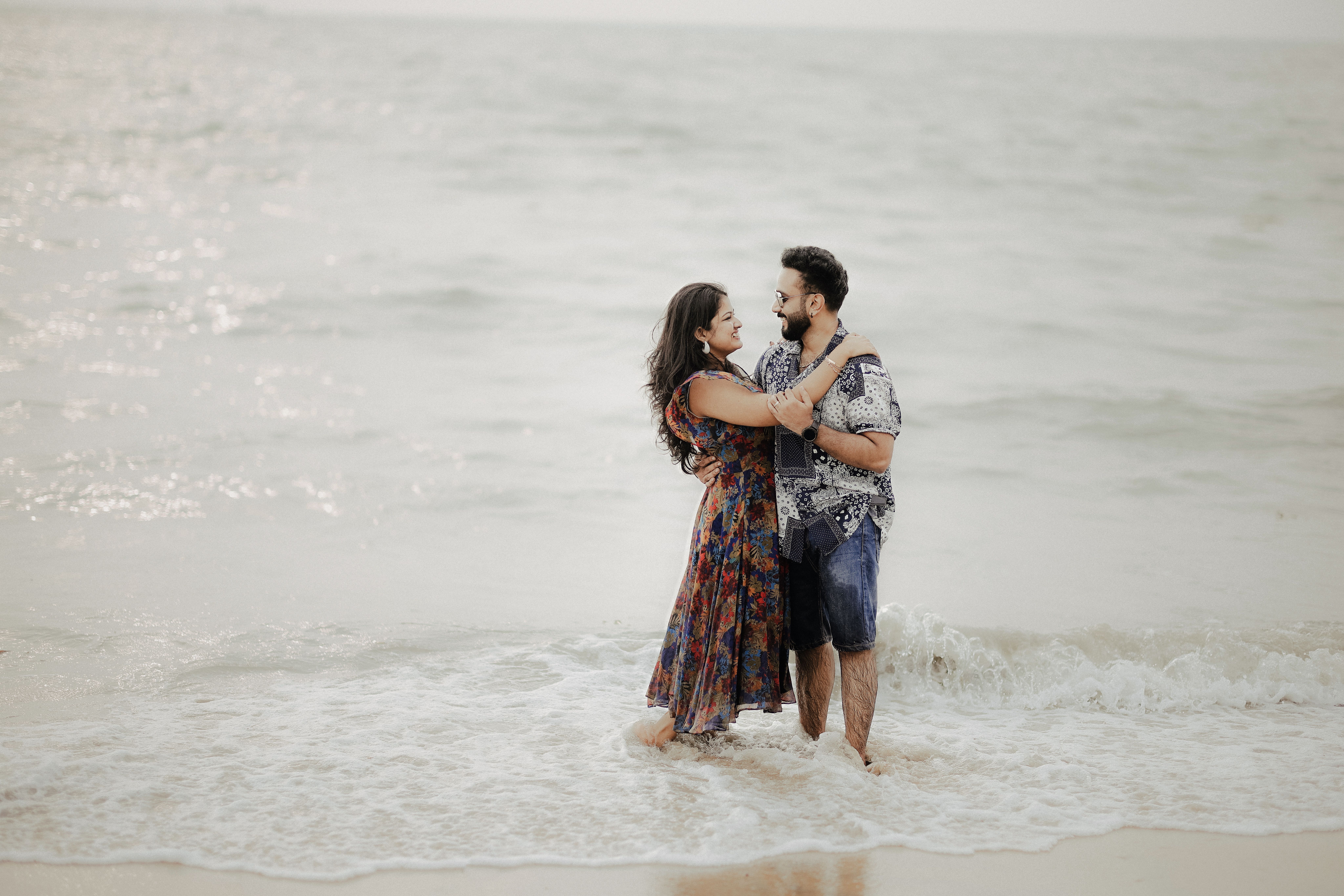 Man Picking Up a Woman while Standing Ankles Deep in the Sea · Free ...