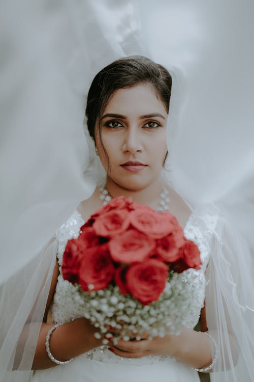 Portrait of Bride with Flowers Bouquet