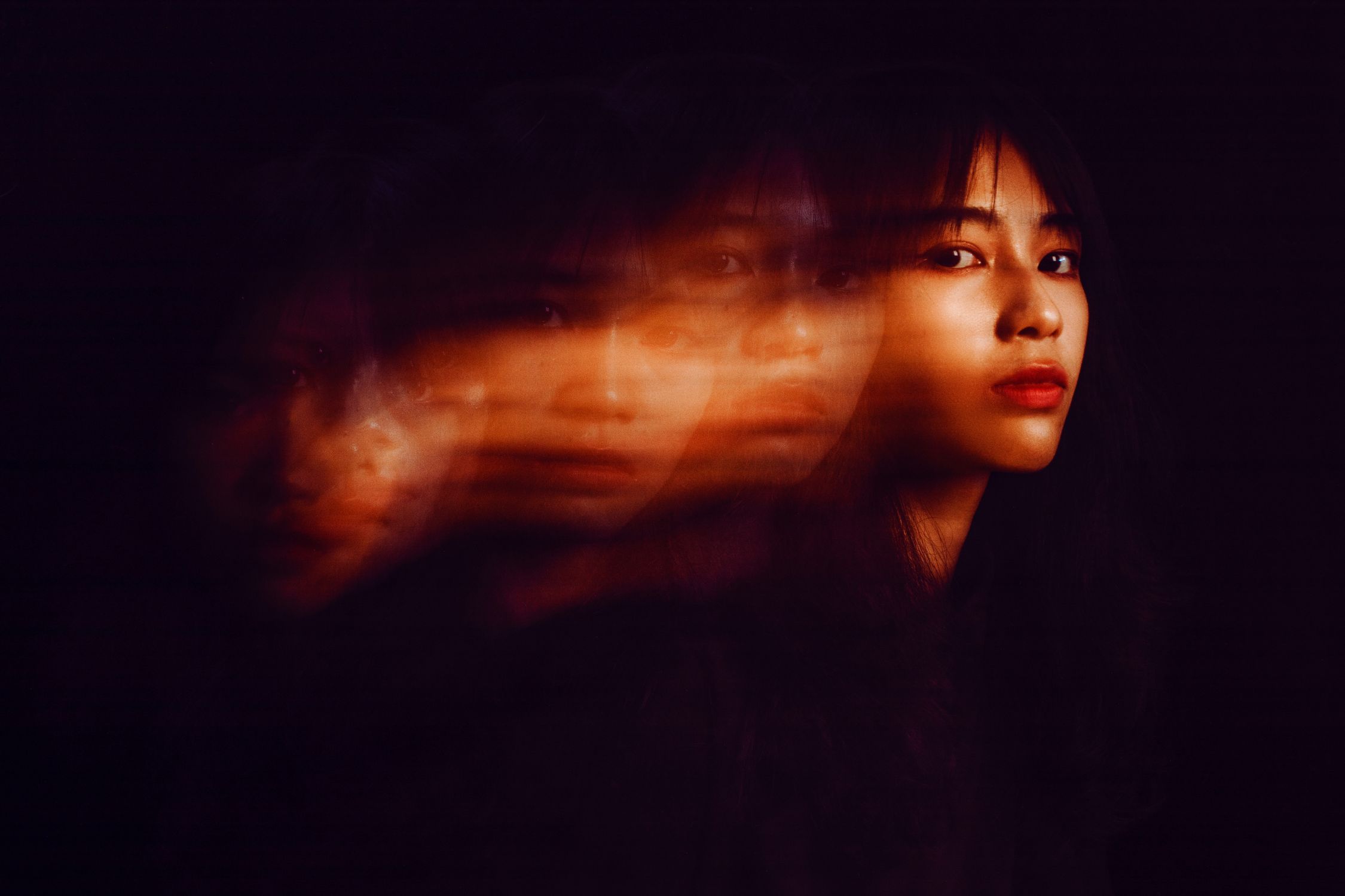 Blurred Woman Face in Darkness · Free Stock Photo