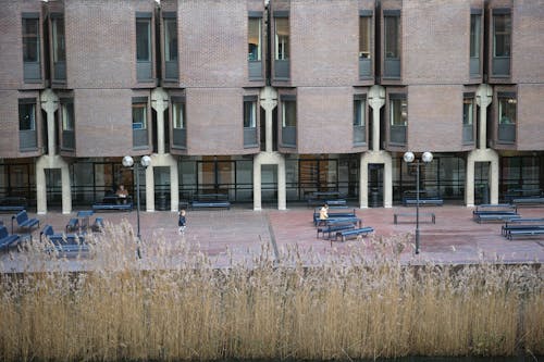 A building with benches and a water fountain