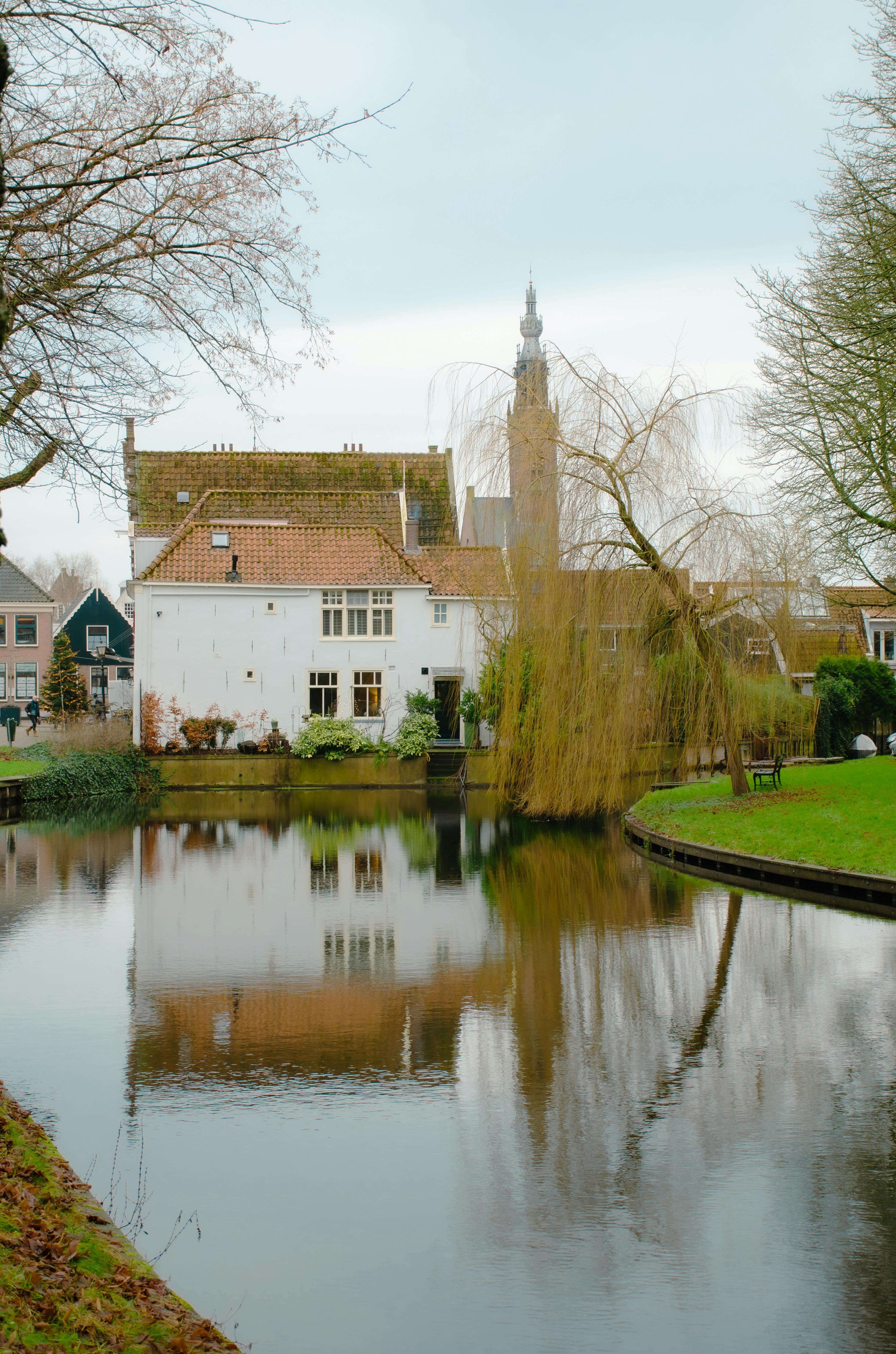 canal and park in amsterdam in autumn