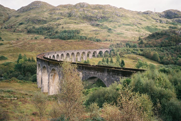 Glenfinnan Viaduct Weaving Through The Scottish Hills