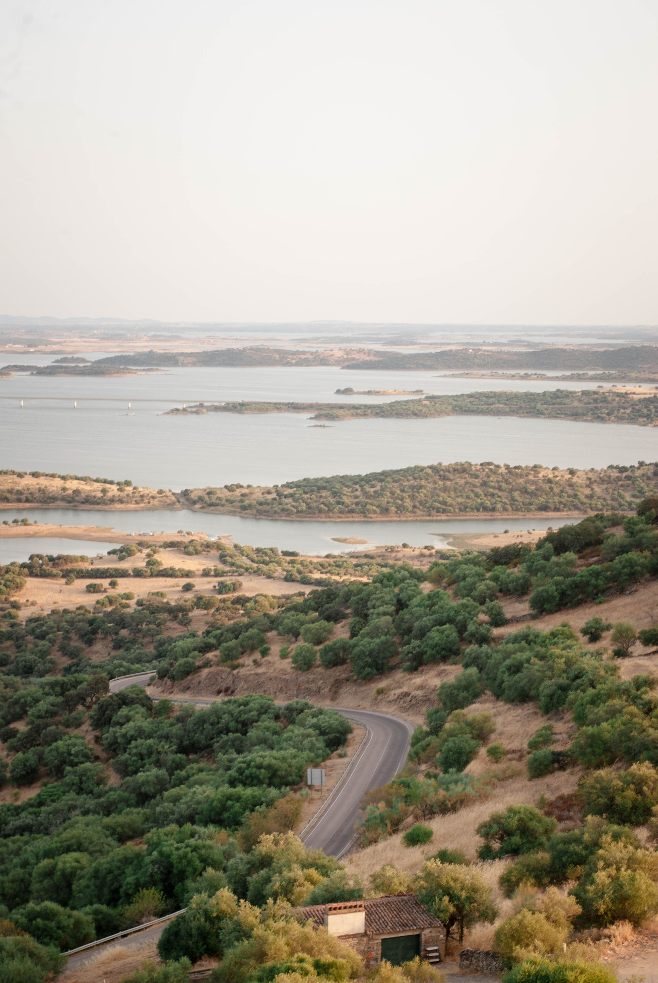 Road on Hills with Lake behind · Free Stock Photo