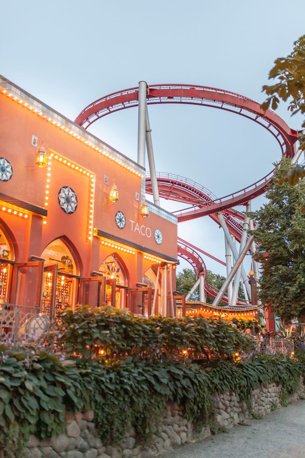 Rocoaster View of a Building and a Rollercoaster in the Amusement Park · Free ...