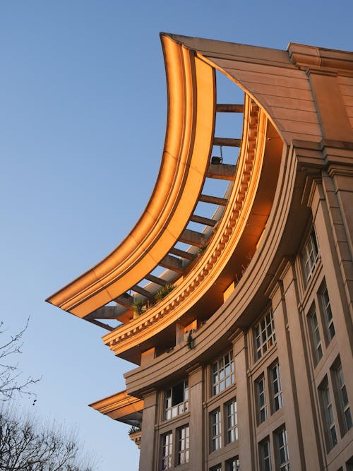 The top of a building with a curved roof