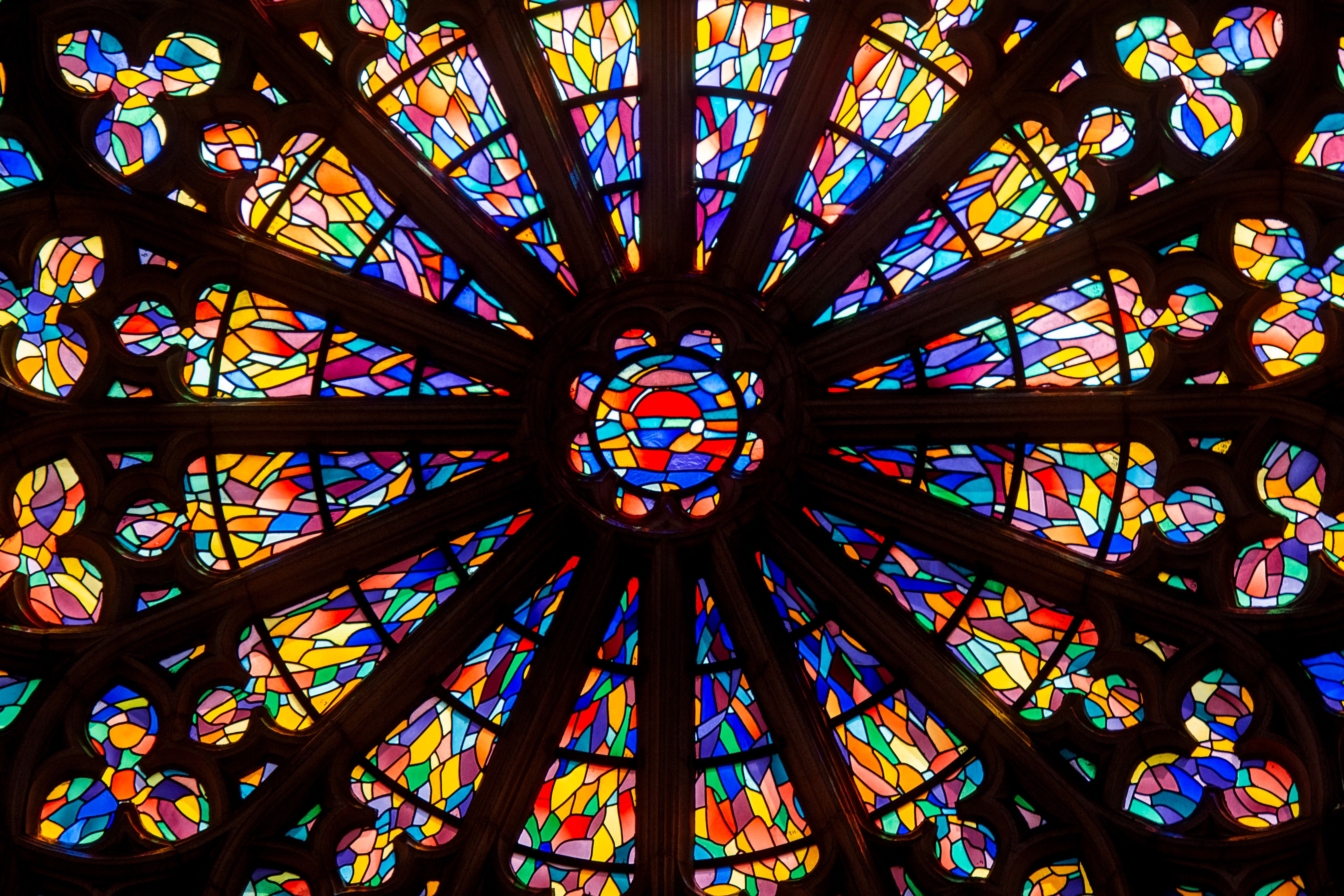 Stained glass window in the cathedral of st peter · Free Stock Photo