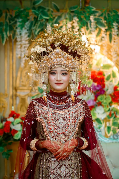 The bride in traditional attire and headdress