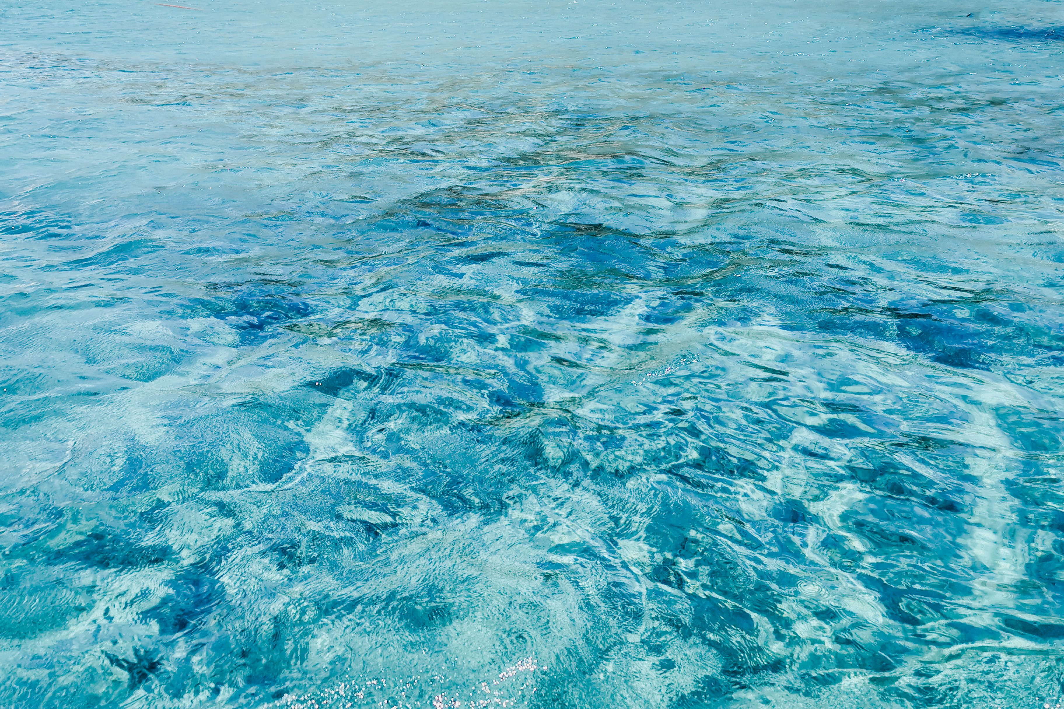Vivid turquoise waters off Antiparos, Greece with a serene and tropical feel.