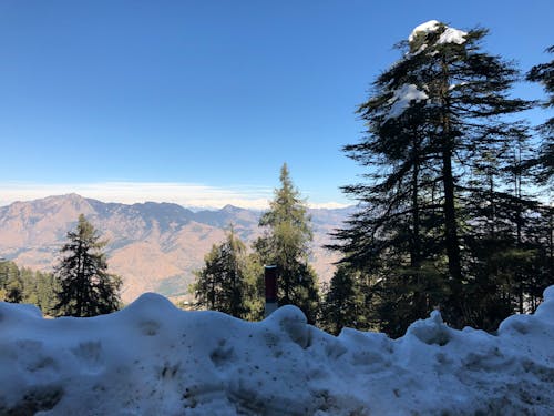 Foto profissional grátis de brown mountain, calma, céu azul