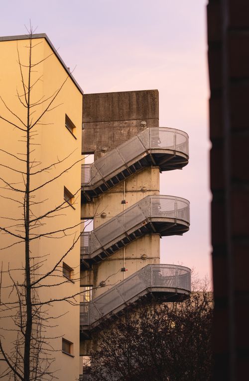 Free Modern urban staircase on a building facade at sunset in Hamburg, Germany. Stock Photo