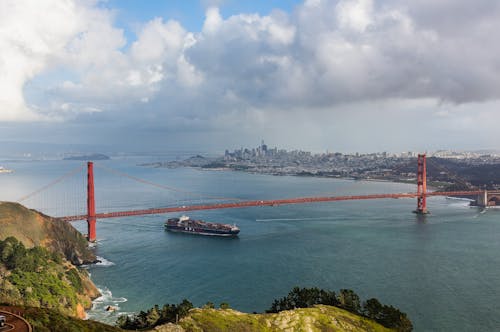 A view of the golden gate bridge from the top of a hill