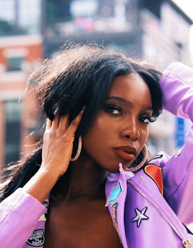 Cinematic portrait of a fashionable woman posing outdoors in Atlanta.