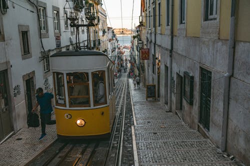 Tram on Narrow Street in Lisbon