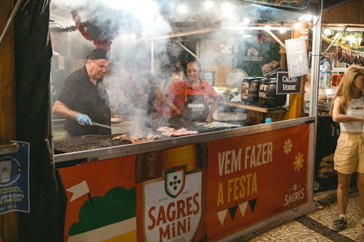 Street food vendors grilling meats at a lively night market in Lisbon, Portugal. A vibrant evening scene.