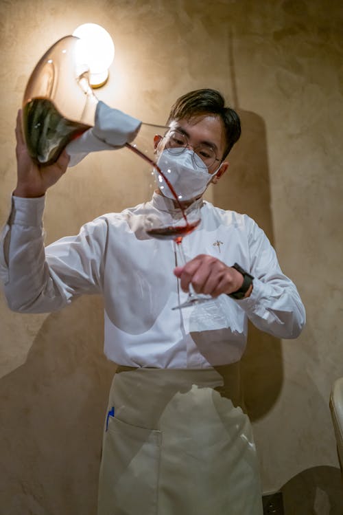 Pouring Wine From a Decanter