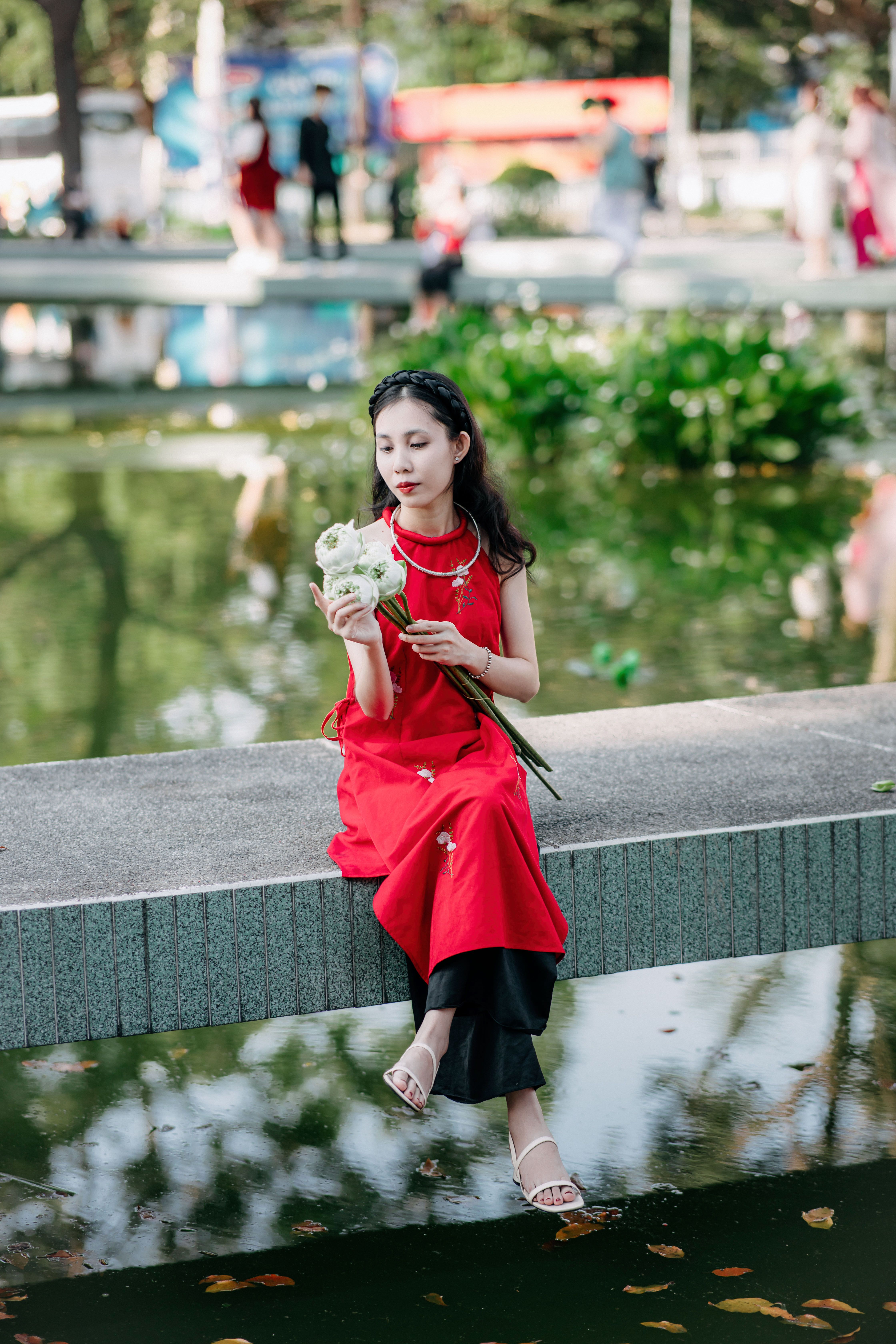 Portrait of a Woman Wearing a Traditional Dress · Free Stock Photo