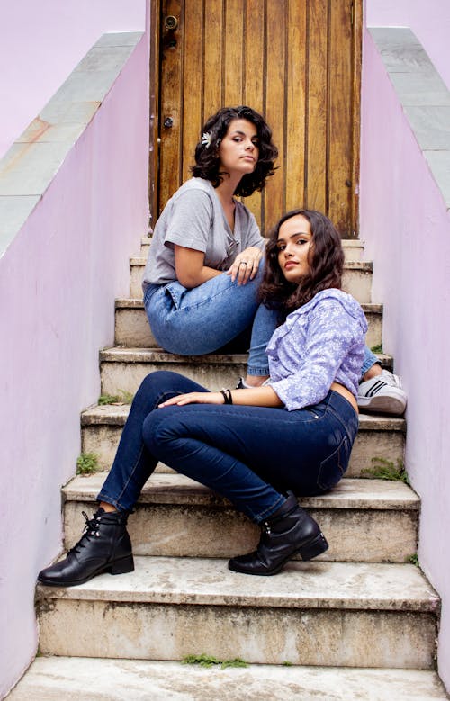 Two Women Sitting on Stairs