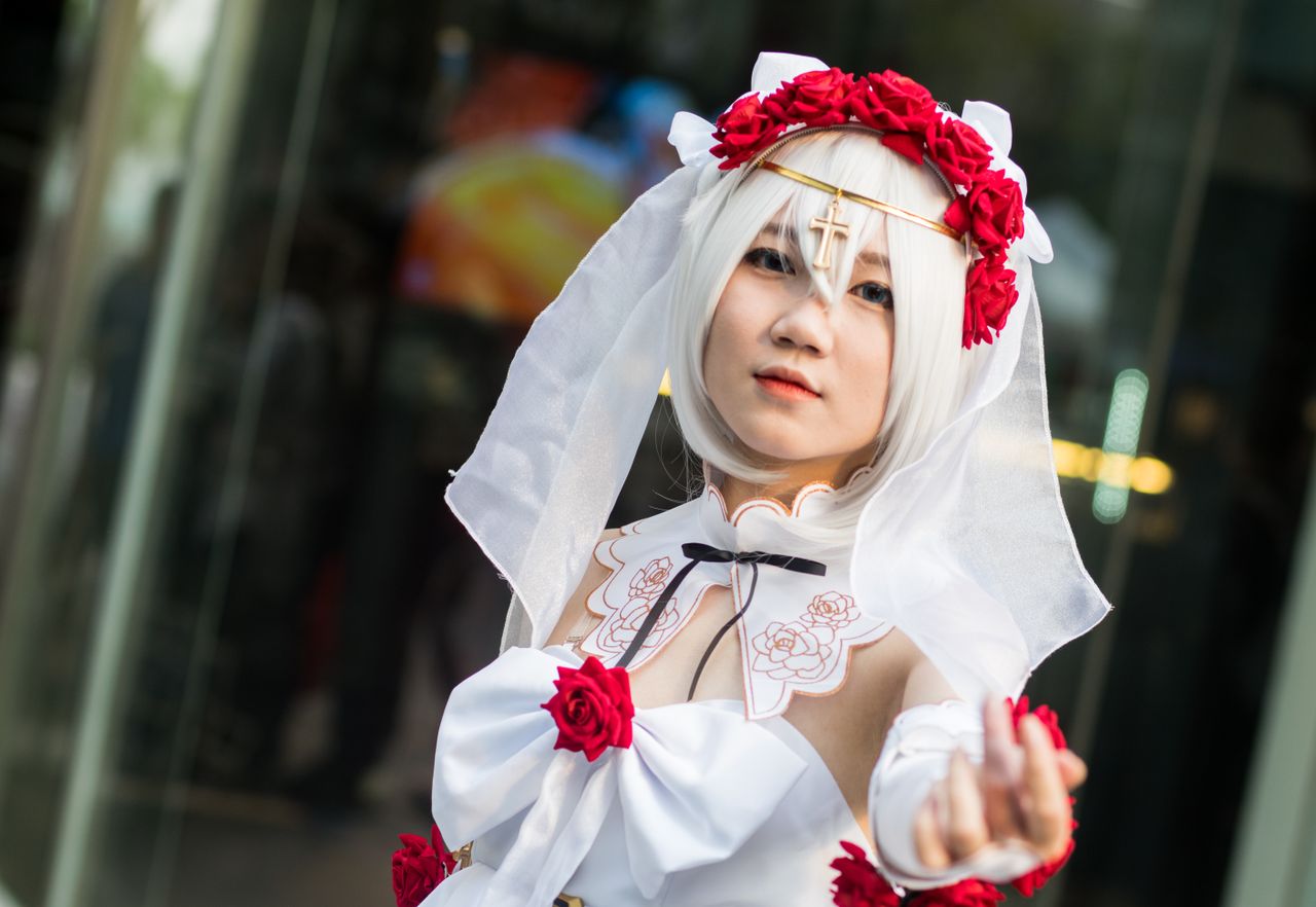 beautiful cosplay featuring a bridal character with floral details in