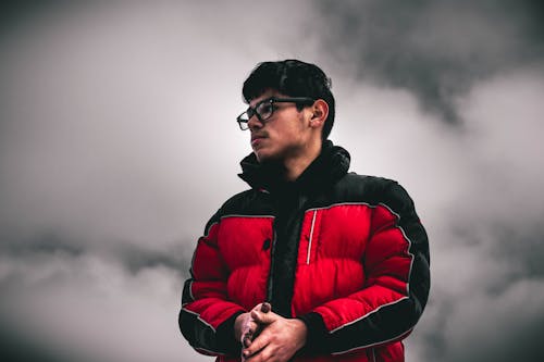 Free Man In Black And Red Jacket Stock Photo