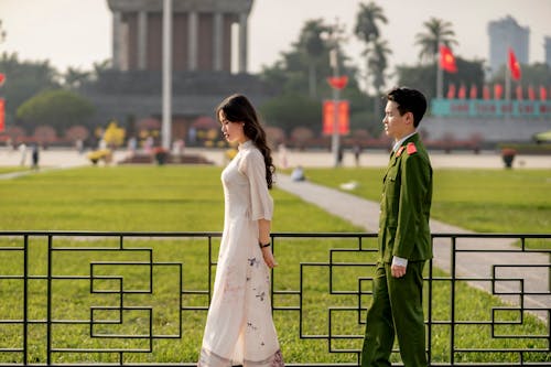 Young Couple Walking in Front of the Ho Chi Minhs Mausoleum