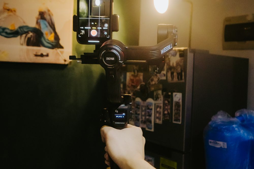 Filming a vertical video on a phone indoors