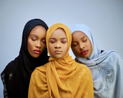 Young Women in Hijabs Posing in Studio 