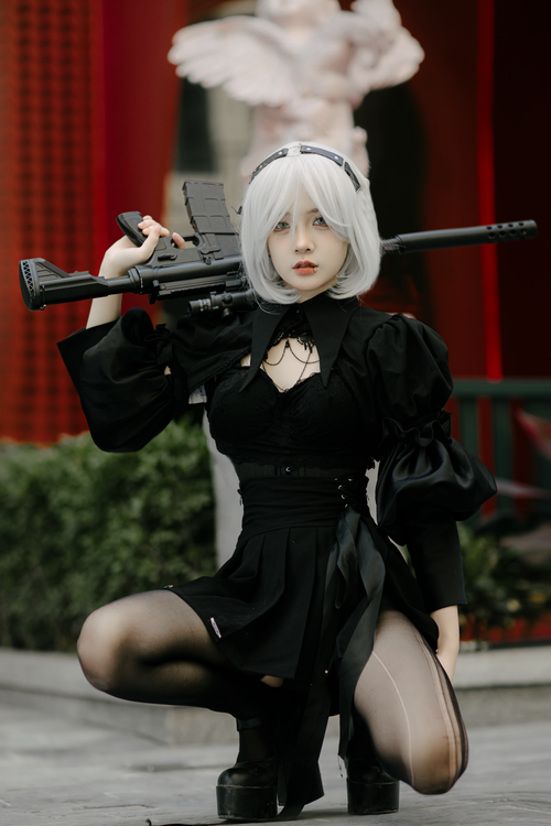 Cosplay Hunting Rifle Portrait of a Female Cosplayer Posing with an Assault Rifle · Free ...