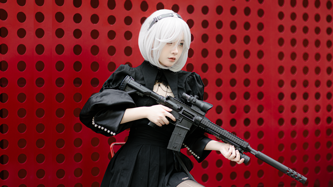 Cosplay Hunting Rifle Portrait of a Female Cosplayer Posing with an Assault Rifle · Free ...