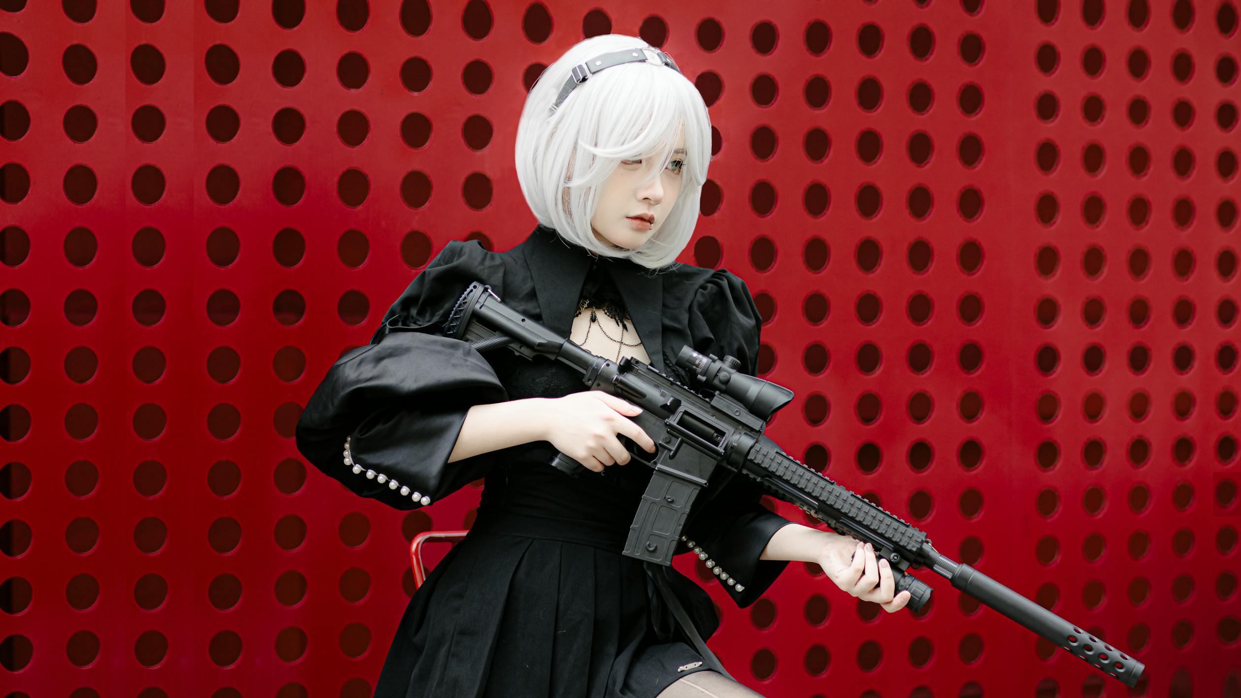 Portrait of a Female Cosplayer Posing with an Assault Rifle · Free ...
