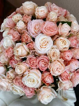 A beautiful bouquet of pink and white roses captured in a detailed close-up, perfect for floral decor themes.