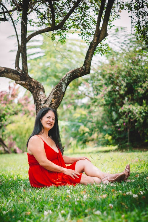 Woman Sitting under Tree