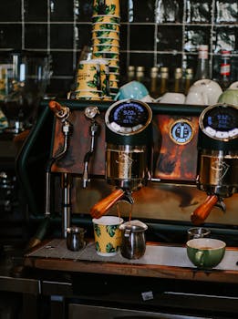 Retro-style espresso machine in a cozy Baku café with coffee cups ready.