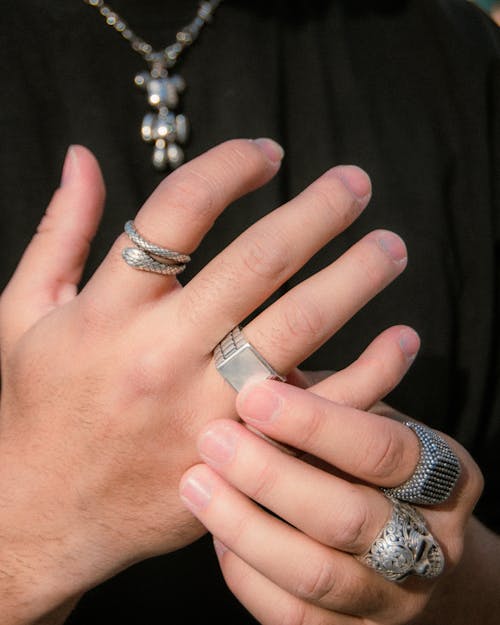 Close-up of Hands with Signet Rings