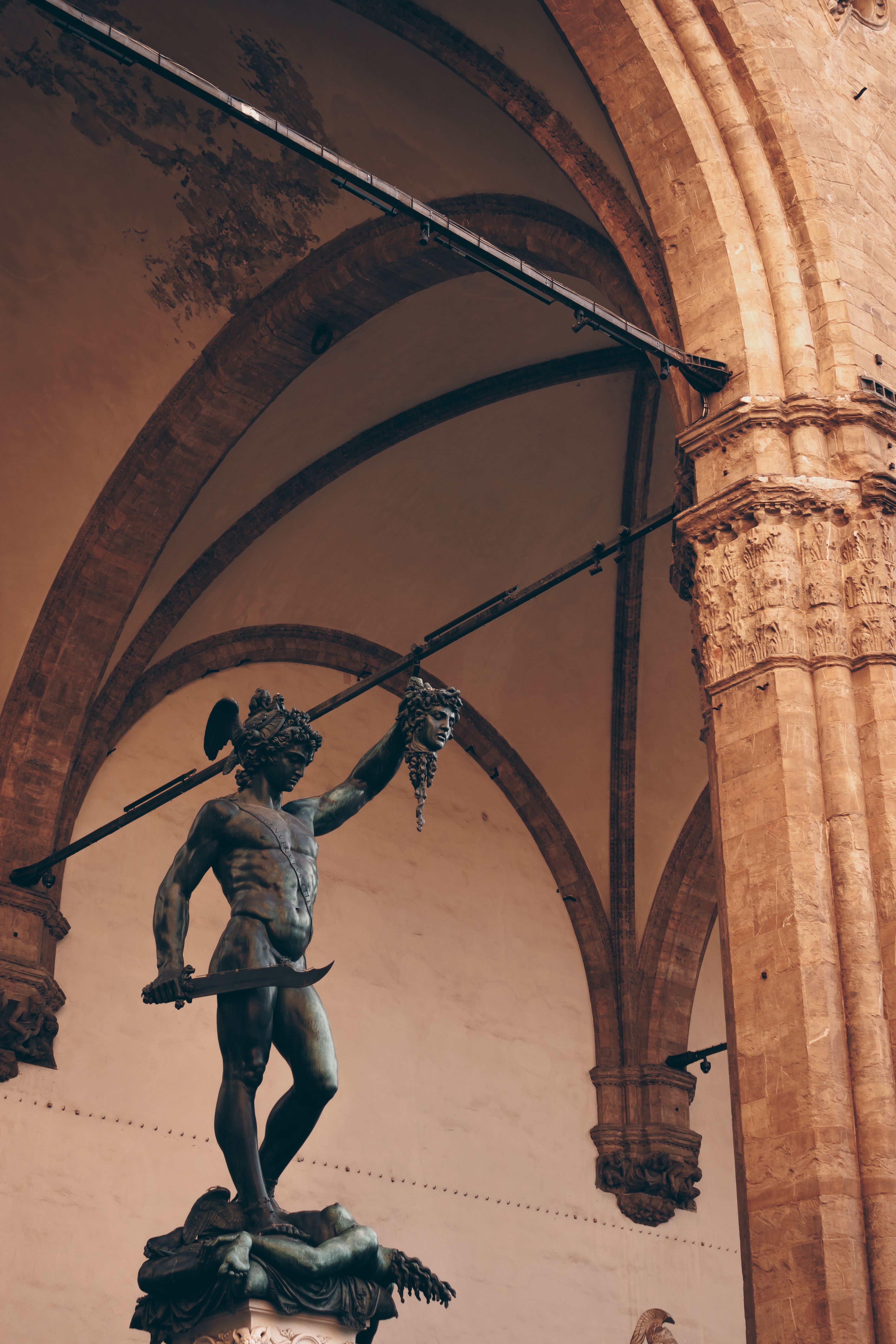 Warrior Statue behind Arch · Free Stock Photo