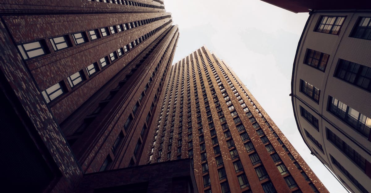 A view of tall buildings from below · Free Stock Photo