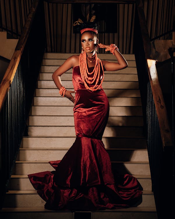 Model Posing in Elegant Red Dress