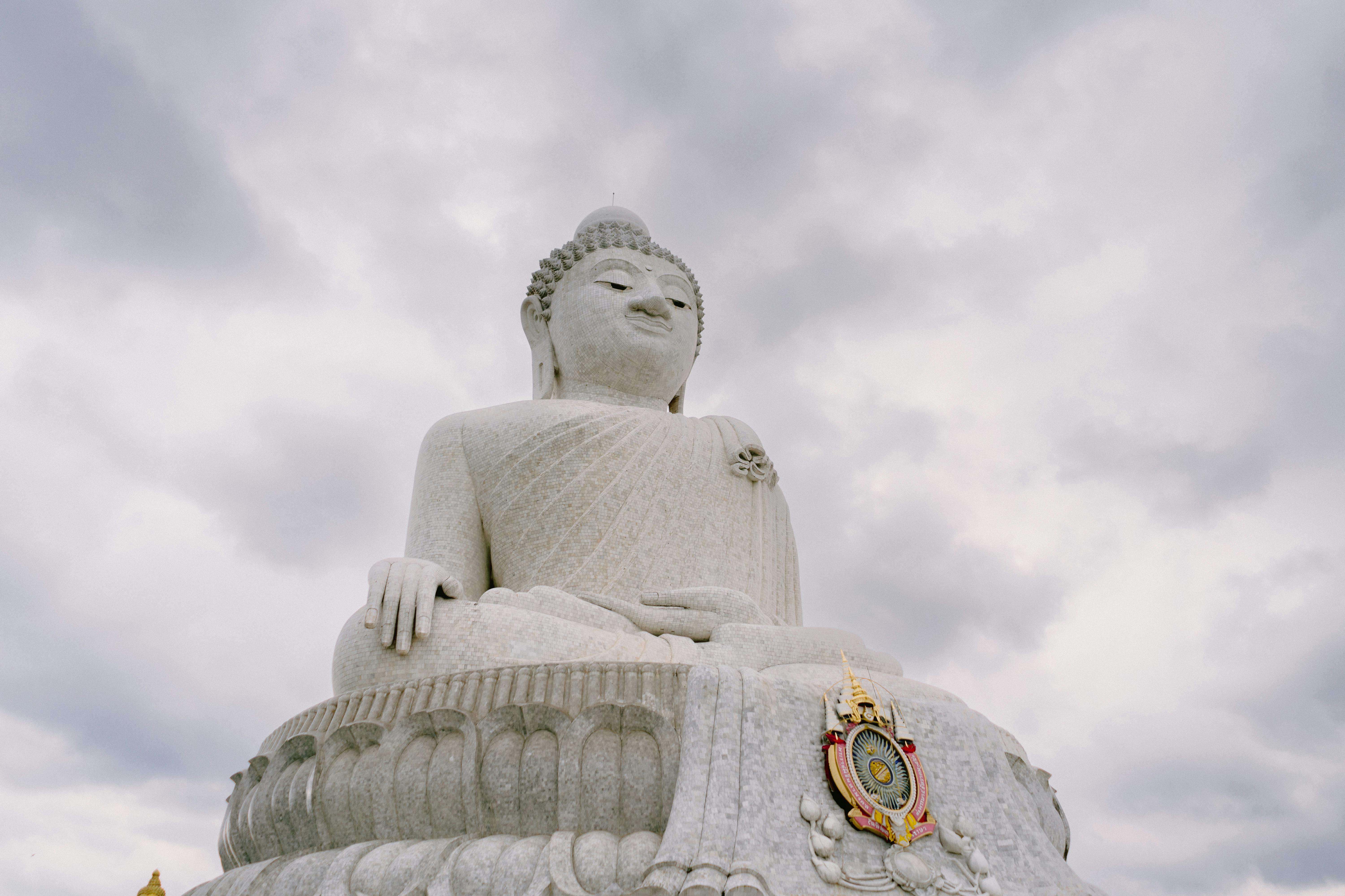 Big Buddha Phuket statue against cloudy sky on Nakkerd Hill