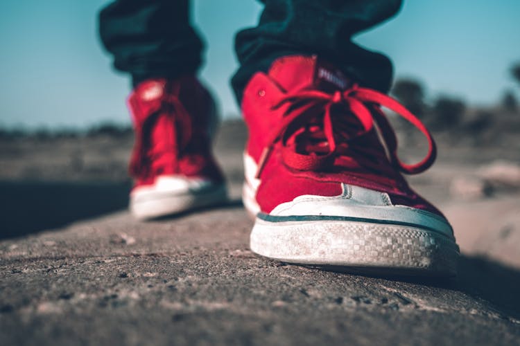 Photo Of Person Wearing Red Shoes