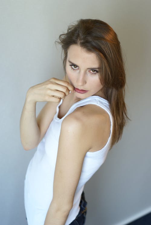 Portrait of Woman in White Tank Top