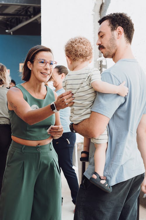 Smiling Woman and Man with Son