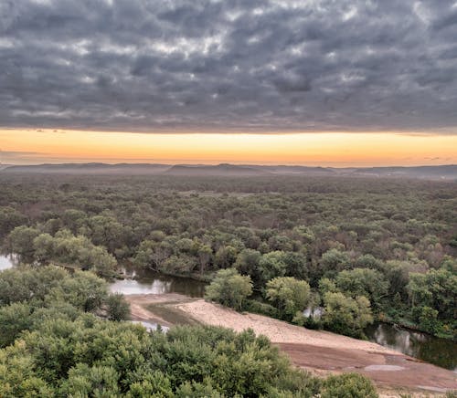 Cloud over Forest at Sunset