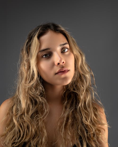 Woman with Blonde Curly Hair